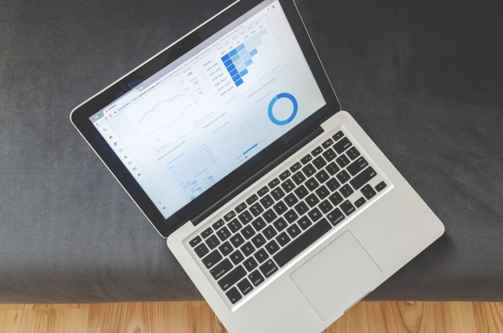 Data analytics dashboard showing email marketing performance metrics on a laptop screen