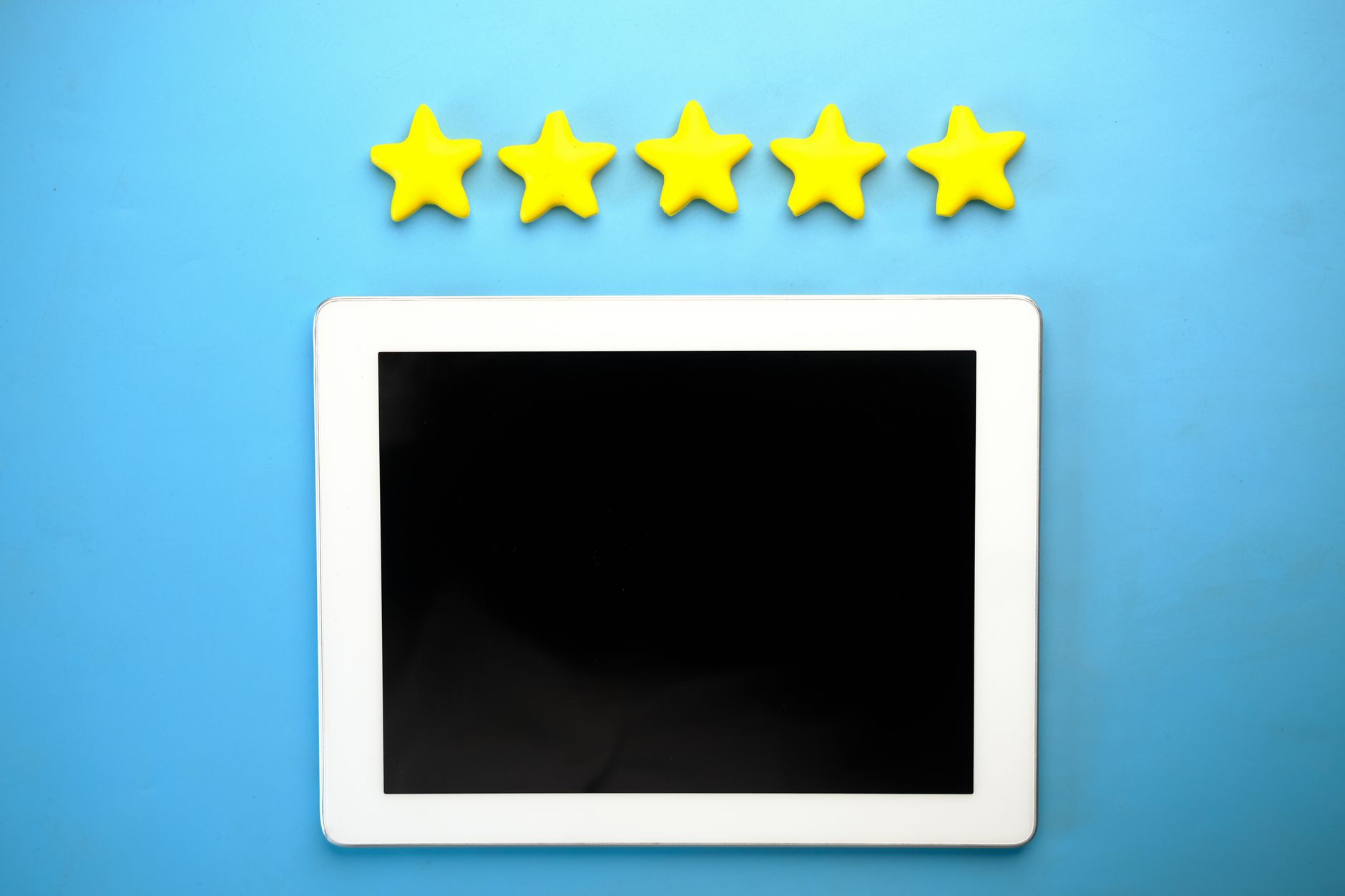 Customer giving five-star review rating on tablet — collecting product reviews for D2C India