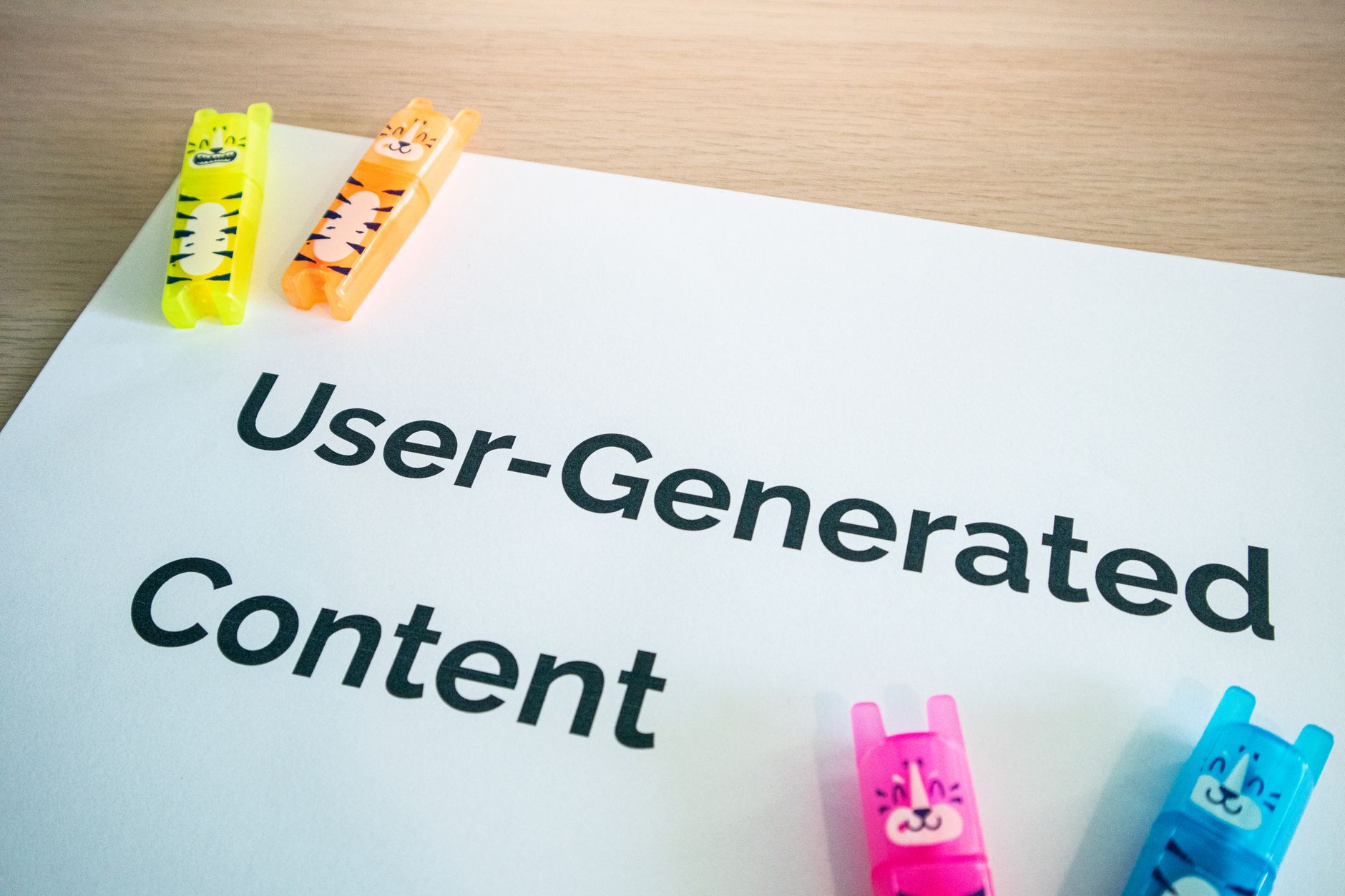 Bright highlighters on a User-Generated Content note — UGC strategy for DTC brands