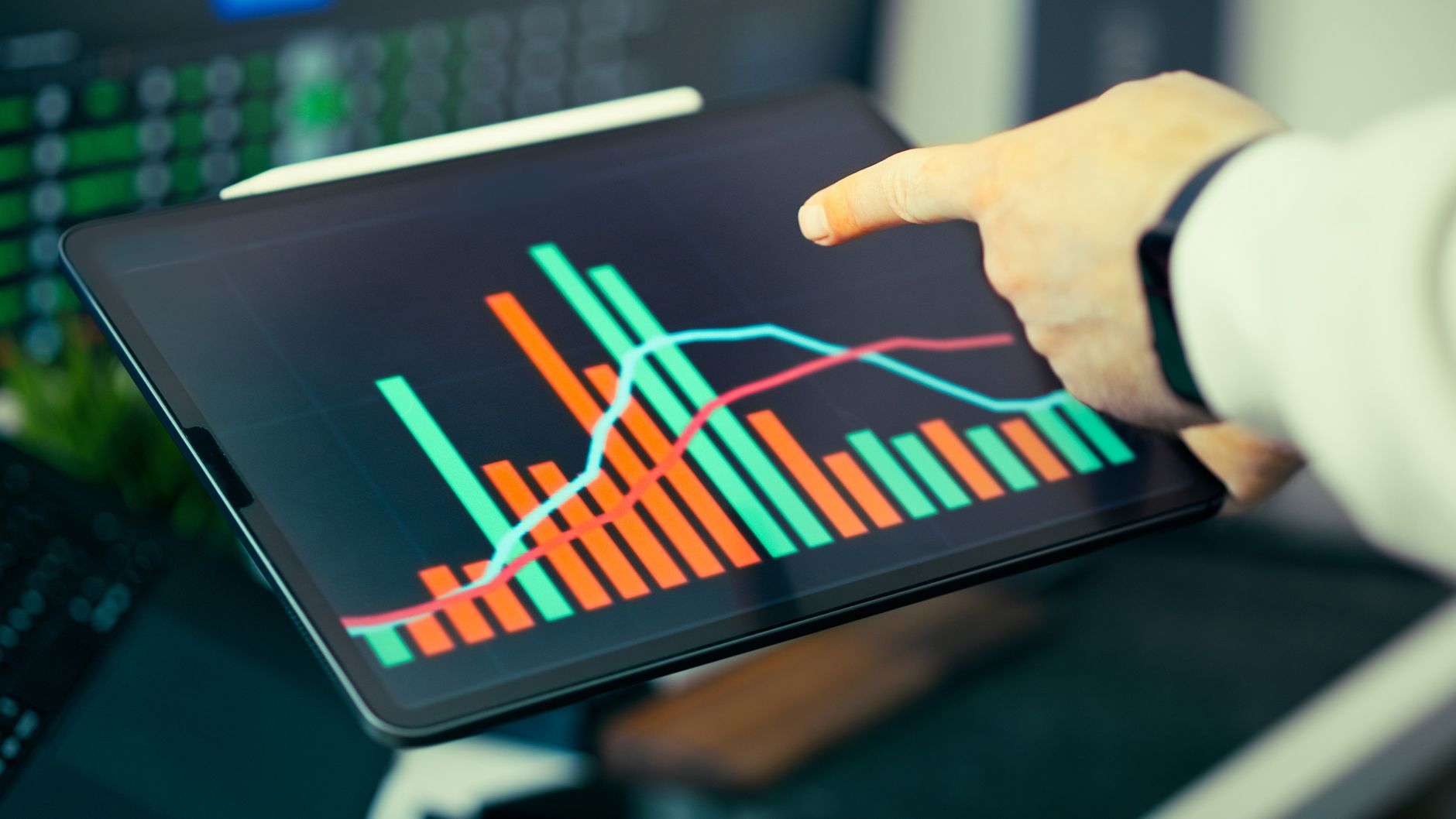 Person analyzing business revenue data on tablet — DTC average order value analytics