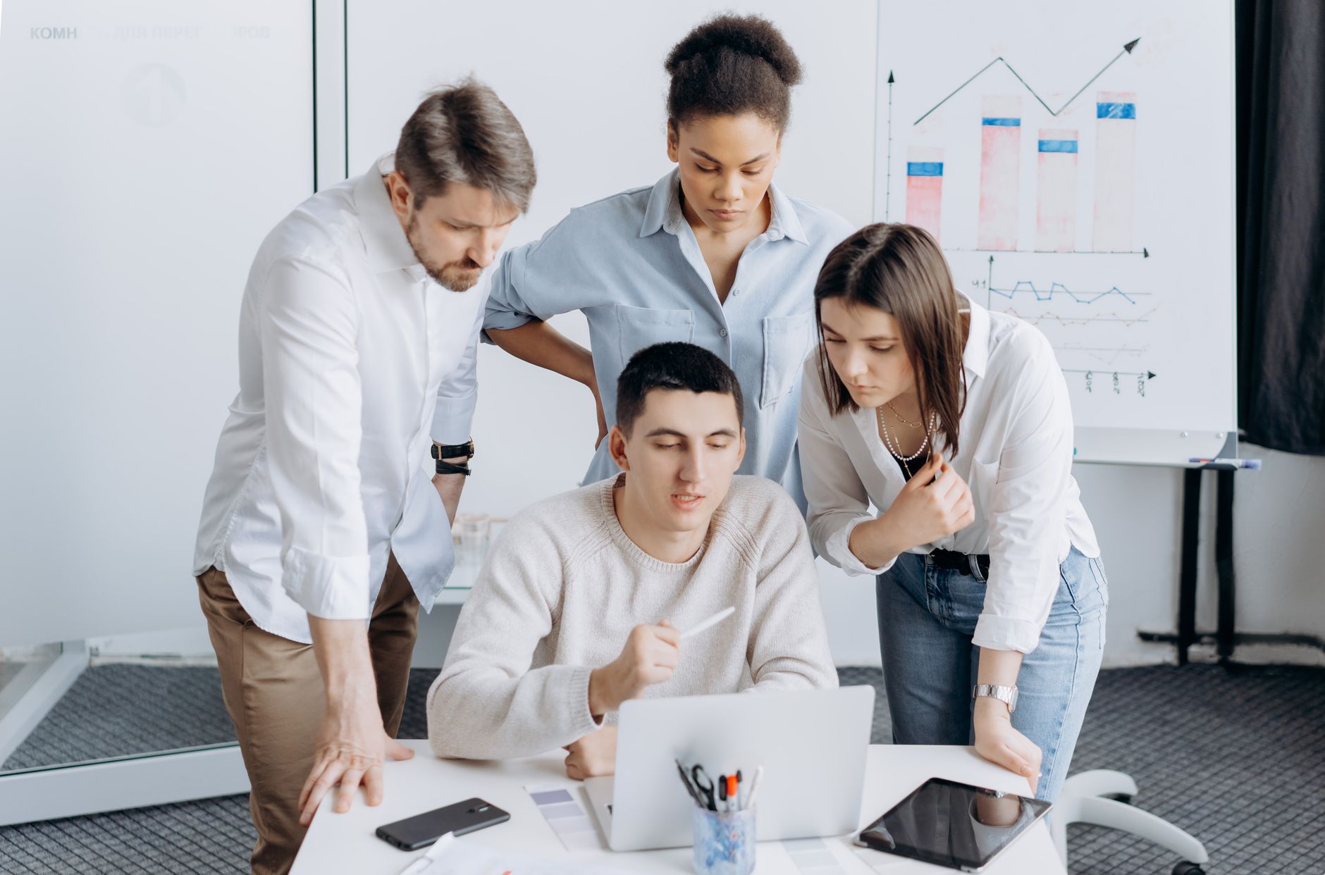 Marketing team collaborating on DTC growth strategy and analytics dashboard