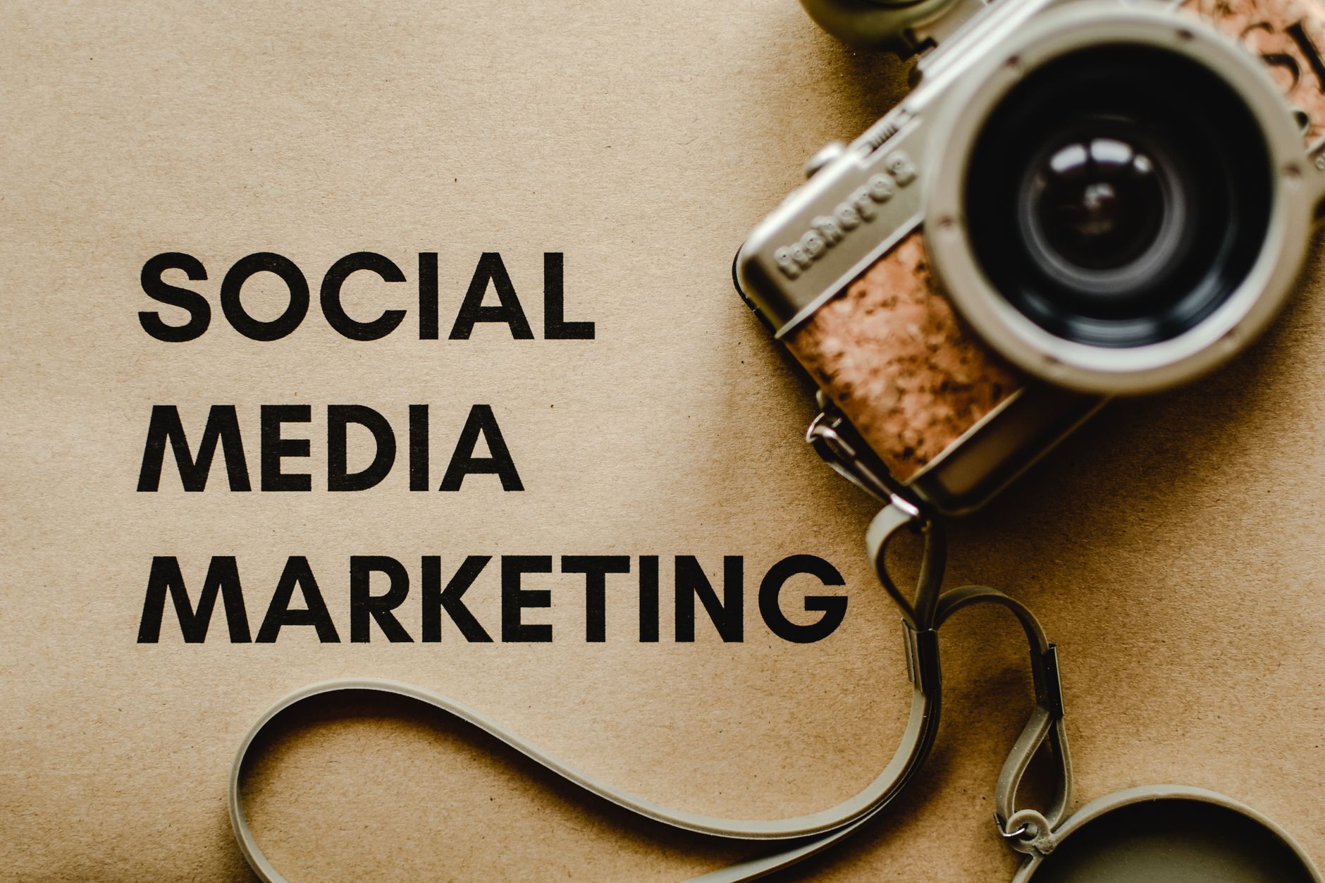 Vintage camera with Social Media Marketing text — DTC brands need a dedicated creative pipeline for TikTok Ads